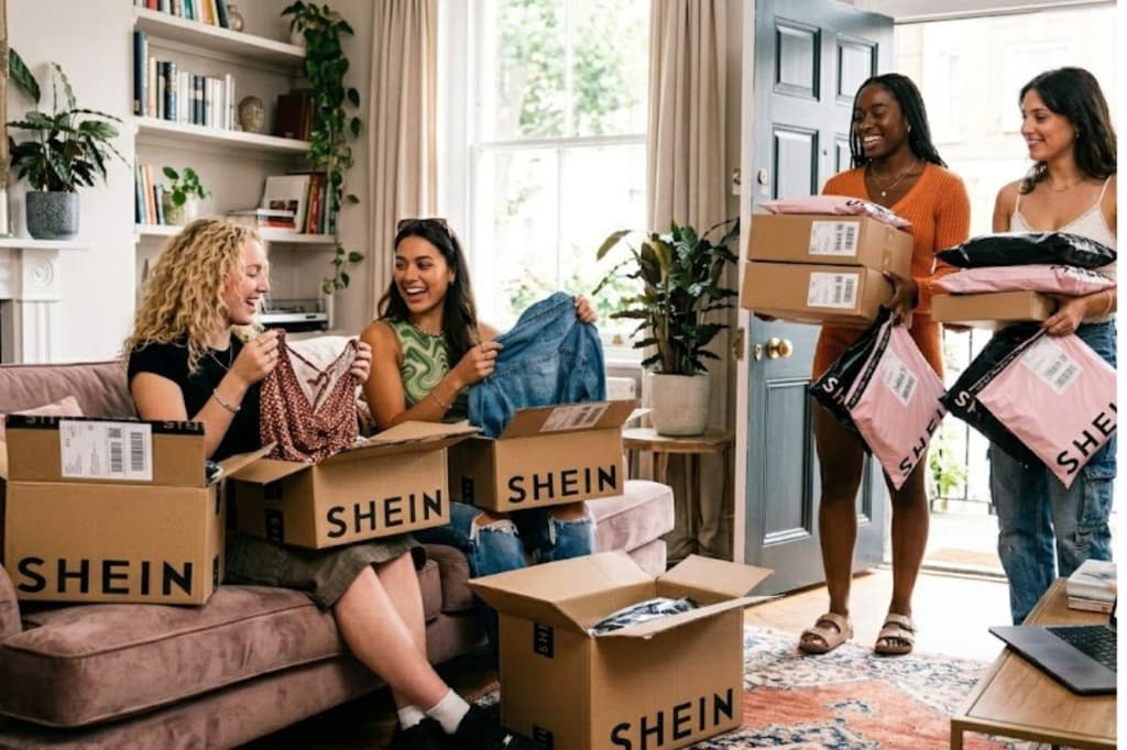 Friends unboxing a SHEIN fashion haul together at home